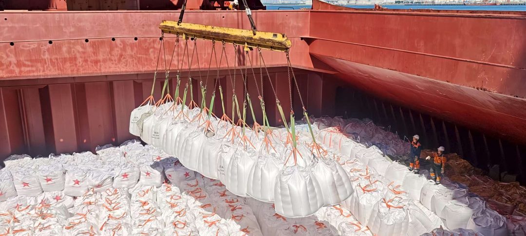 Jumbo bags being lifted into the hold of a break bulk vessel