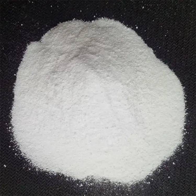 Close-up of white crystalline melamine powder
